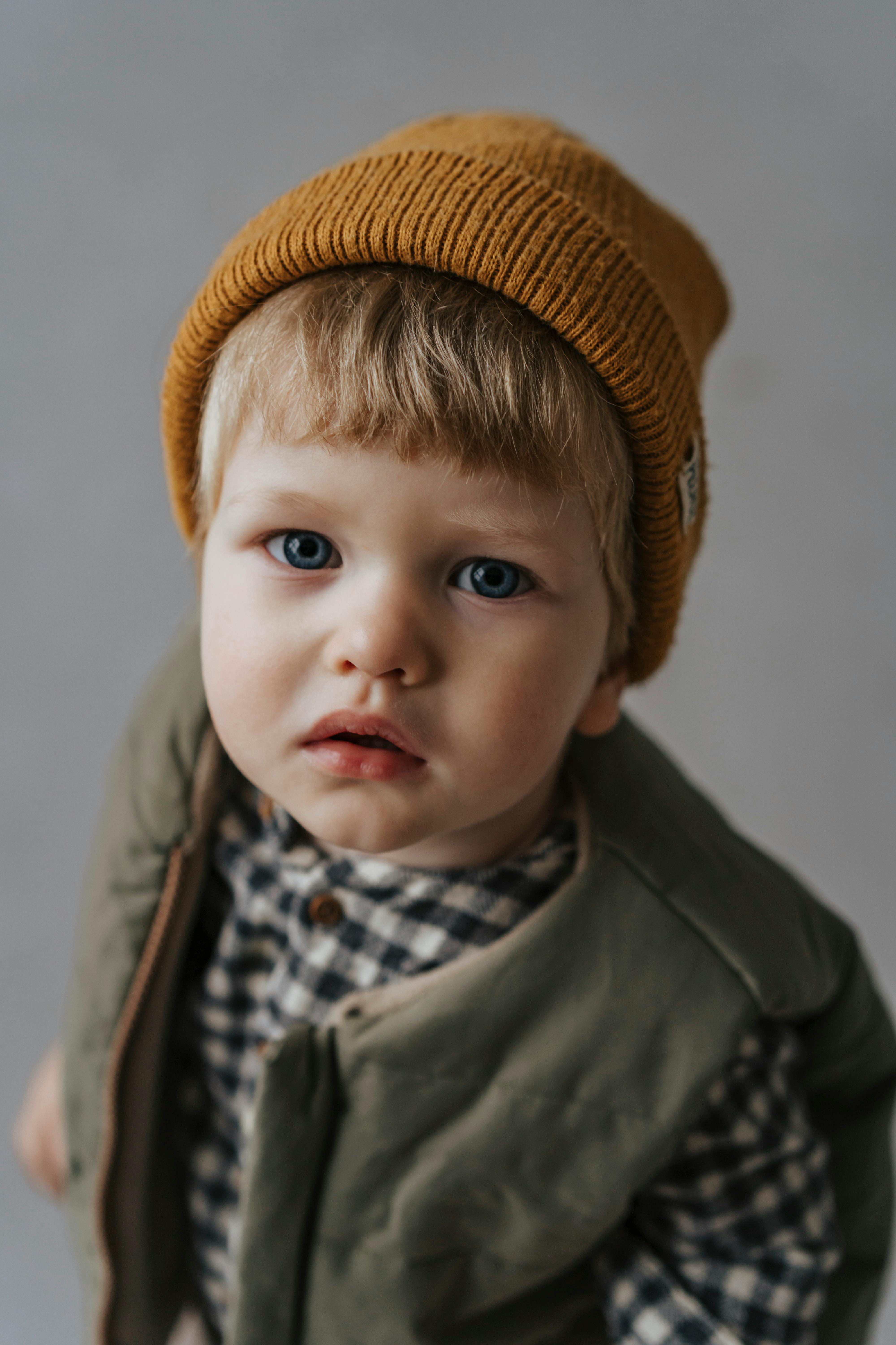 cute baby boy with brown hair and blue eyes