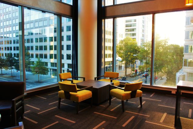 Bright consultation meeting room with skyline