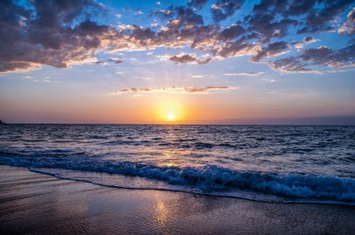 Praia Durante O Pôr Do Sol