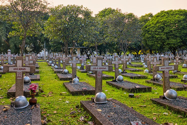 Gravestones With Crosses On Cemetery