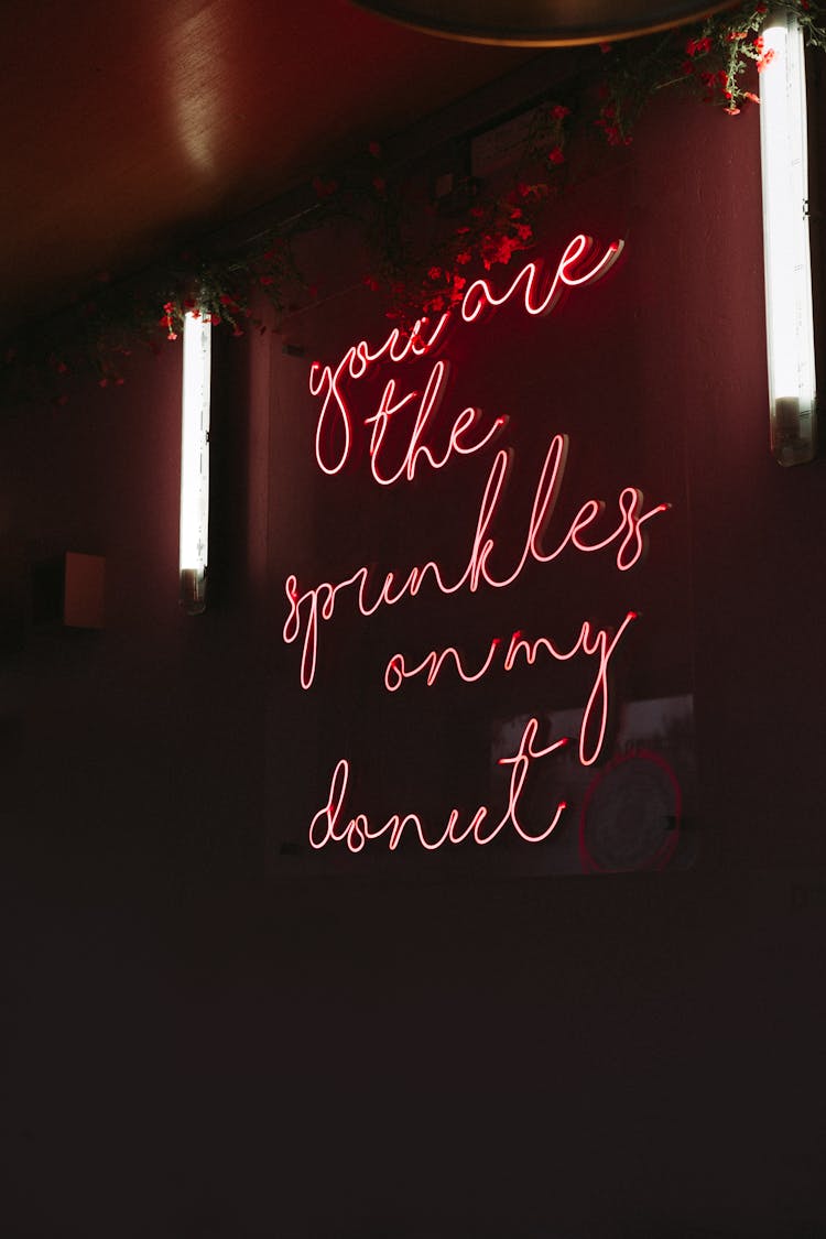 Glowing Inscription On Wall In Cafe