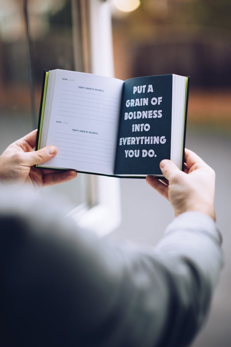 Faceless Man With Inscription In Open Notebook In House