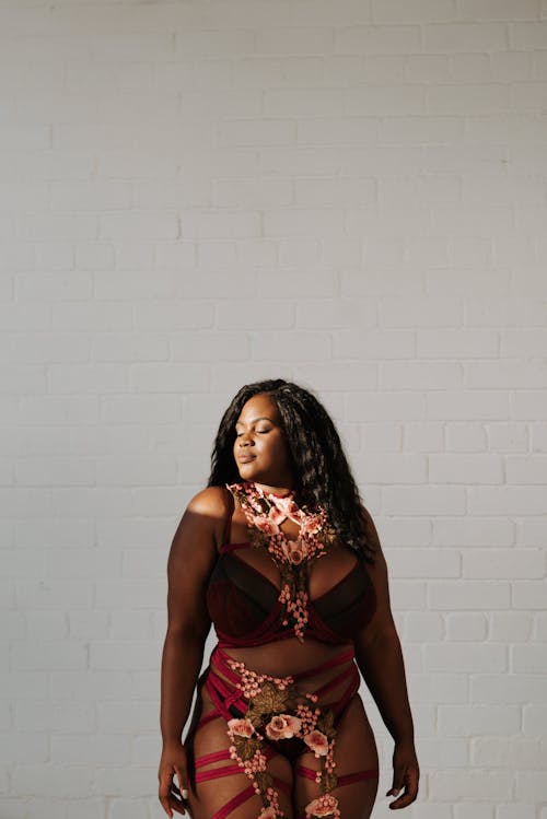 Serene black plus size woman in underwear