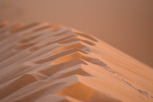 Close-Up Photo of Brown Sand