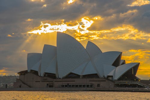 Kostnadsfri bild av operahuset i sydney, soluppgång