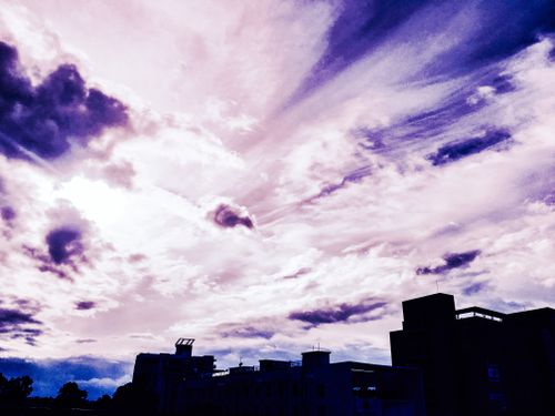 Free Dramatic sky over Bengaluru cityscape with striking cloud formations. Stock Photo
