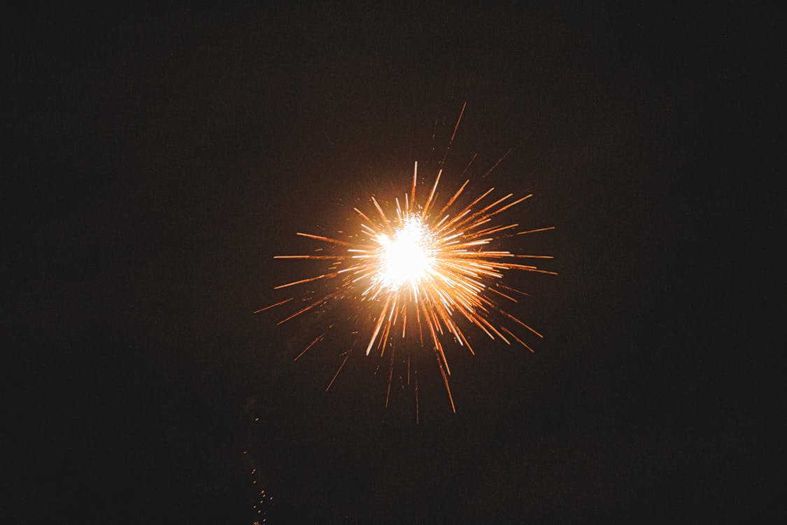 Free Bright firework illuminating dark sky Stock Photo