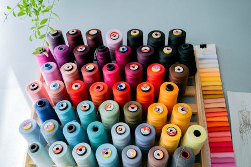 Photo of Colorful Thread Rolls