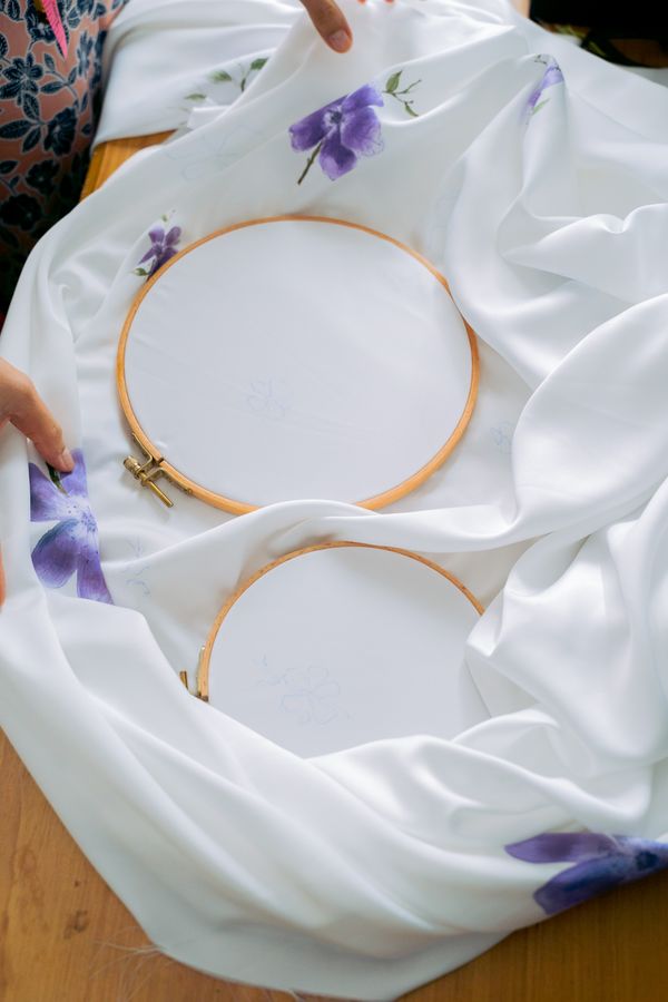 Two embroidery hoops with purple floral designs — photo by Anna Tarazevich on Pexels