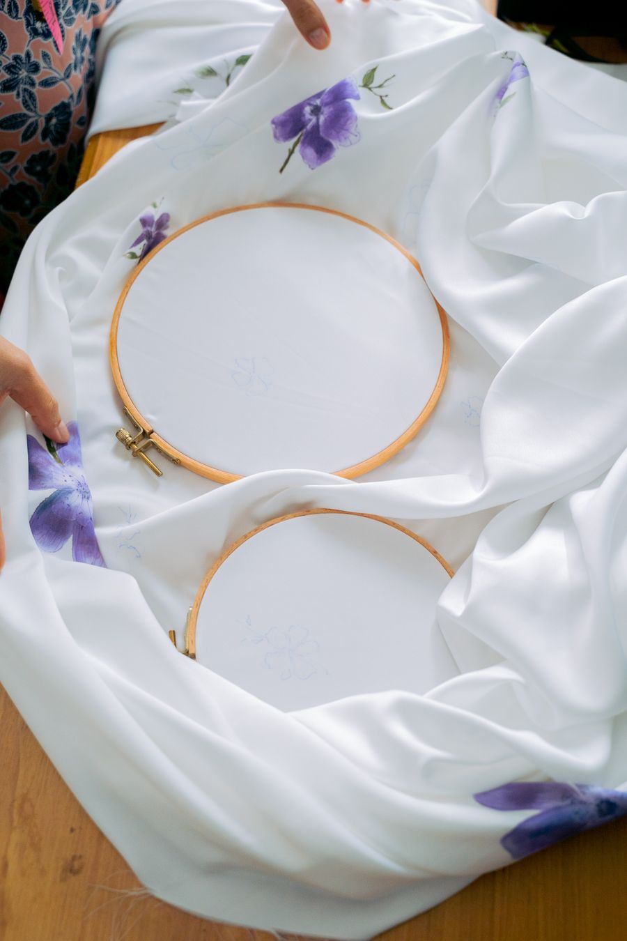 Floral hoops on white linen