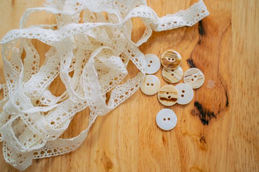 White Lace on Brown Wooden Table