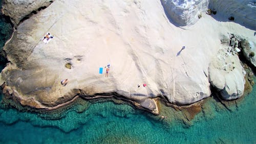 Free Aerial View of People on Beach Stock Photo