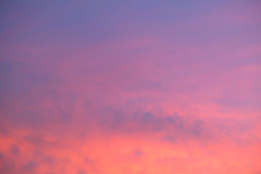 Stunning view of a pink and purple sky at sunset, perfect for backgrounds.