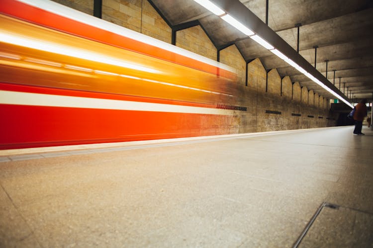 Long Exposure Shot Of A Train Passing The Subway