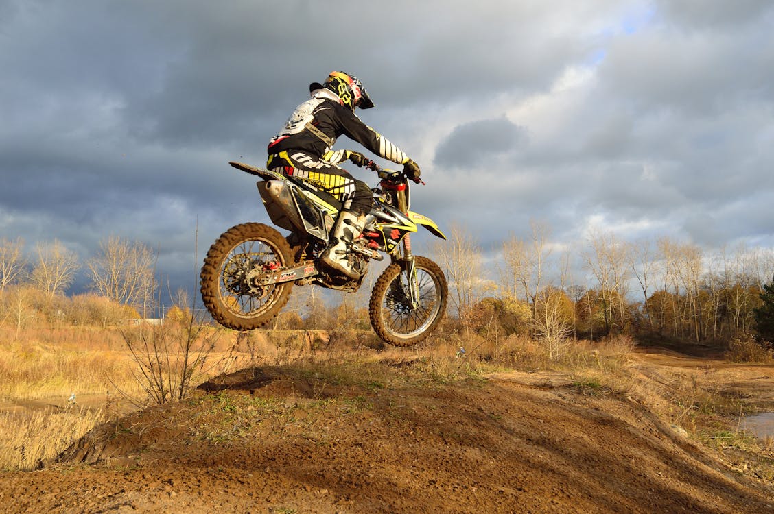 Free Motocross Rider on His Dirt Bike during Daytime Stock Photo