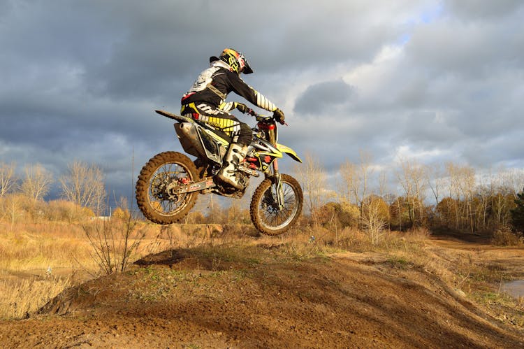 Motocross Rider On His Dirt Bike During Daytime