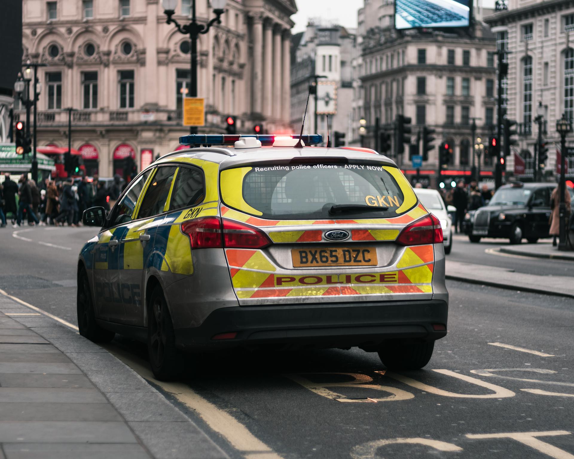 A Police Car Parked on the Roadside