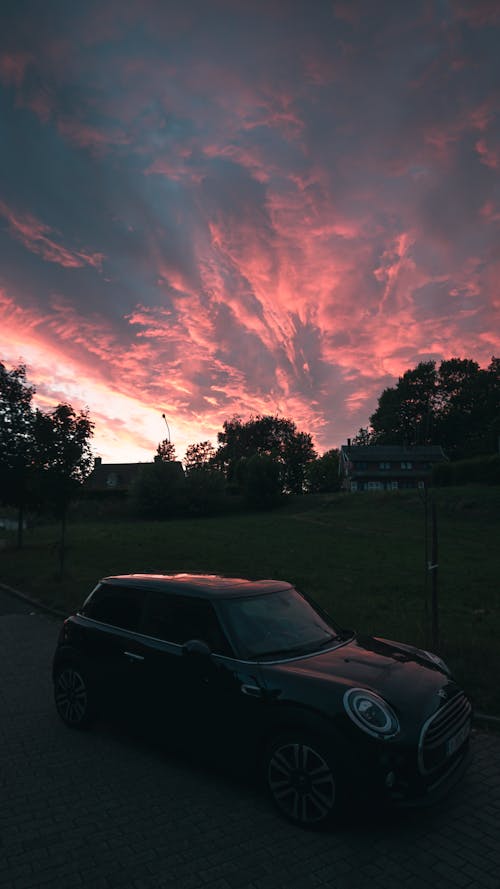 Kostenloses Stock Foto zu mini cooper, rosa sonnenuntergang, sonnenuntergang