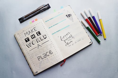 Free Inspirational Quotes Written On A Planner Stock Photo
