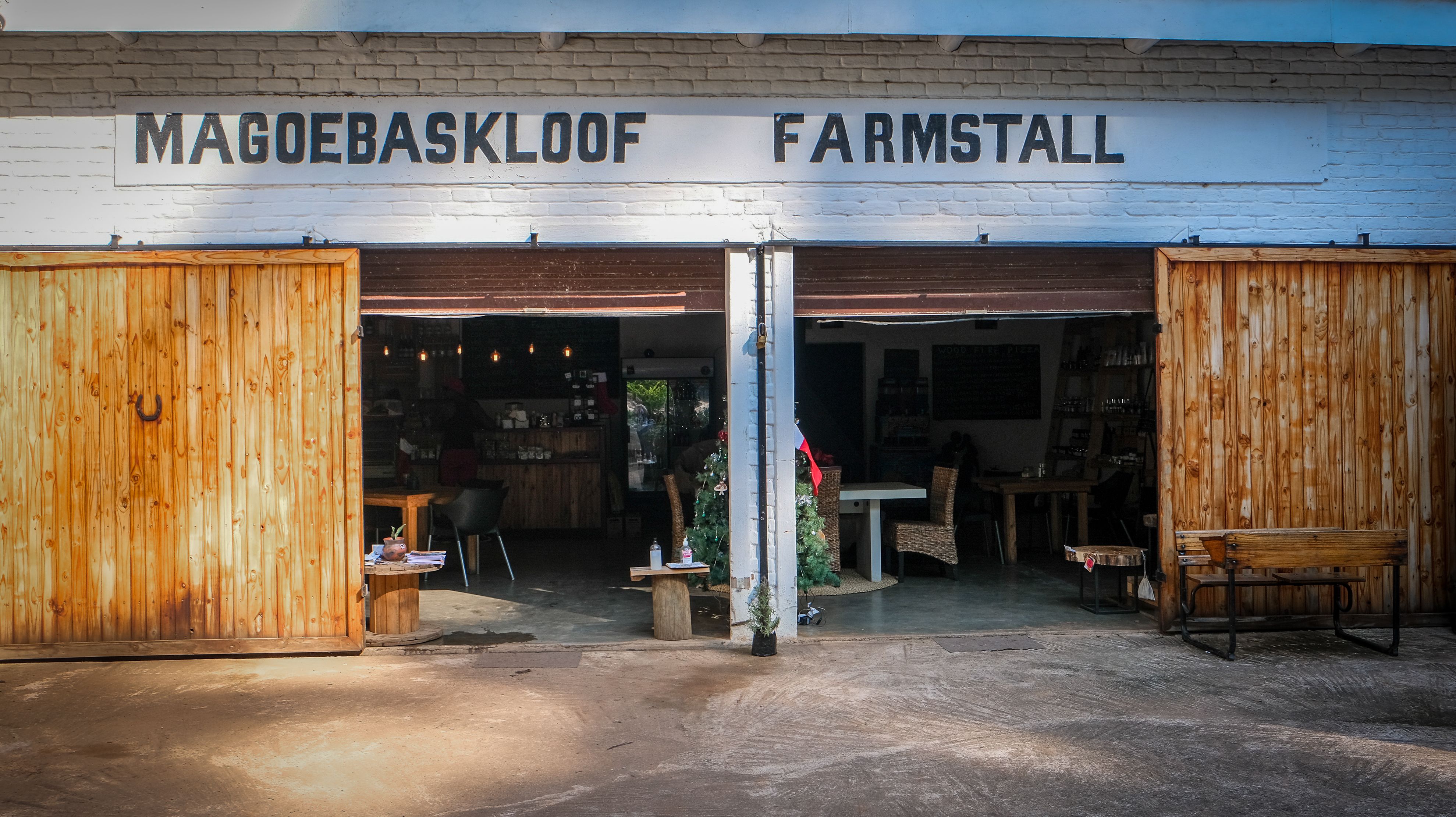 A welcoming farm shop entrance with fresh produce displays