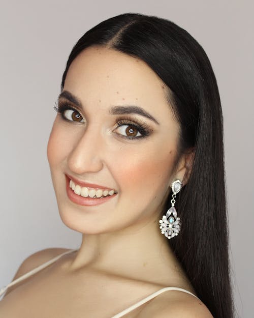 Smiling Brunette Woman in Glam Makeup 