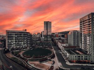 Template preview: city skyline at sunset — photo by Barrett Shutt on Pexels