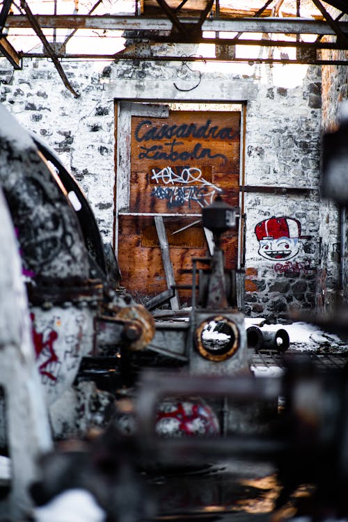 Red and White Graffiti on Wall