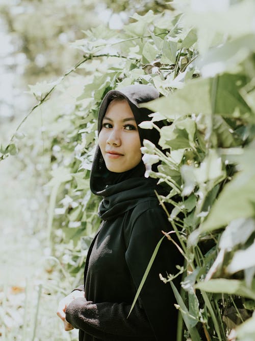 A Woman Smiling at the Camera