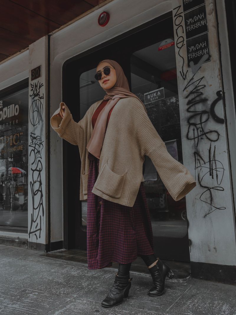 woman in a knit sweater dress