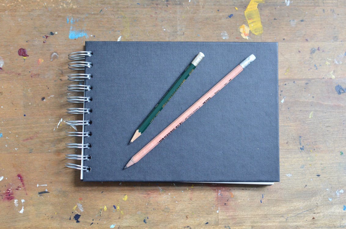 Brown Notebook Or Sketchbook On Wooden Table, Art, Education Stock