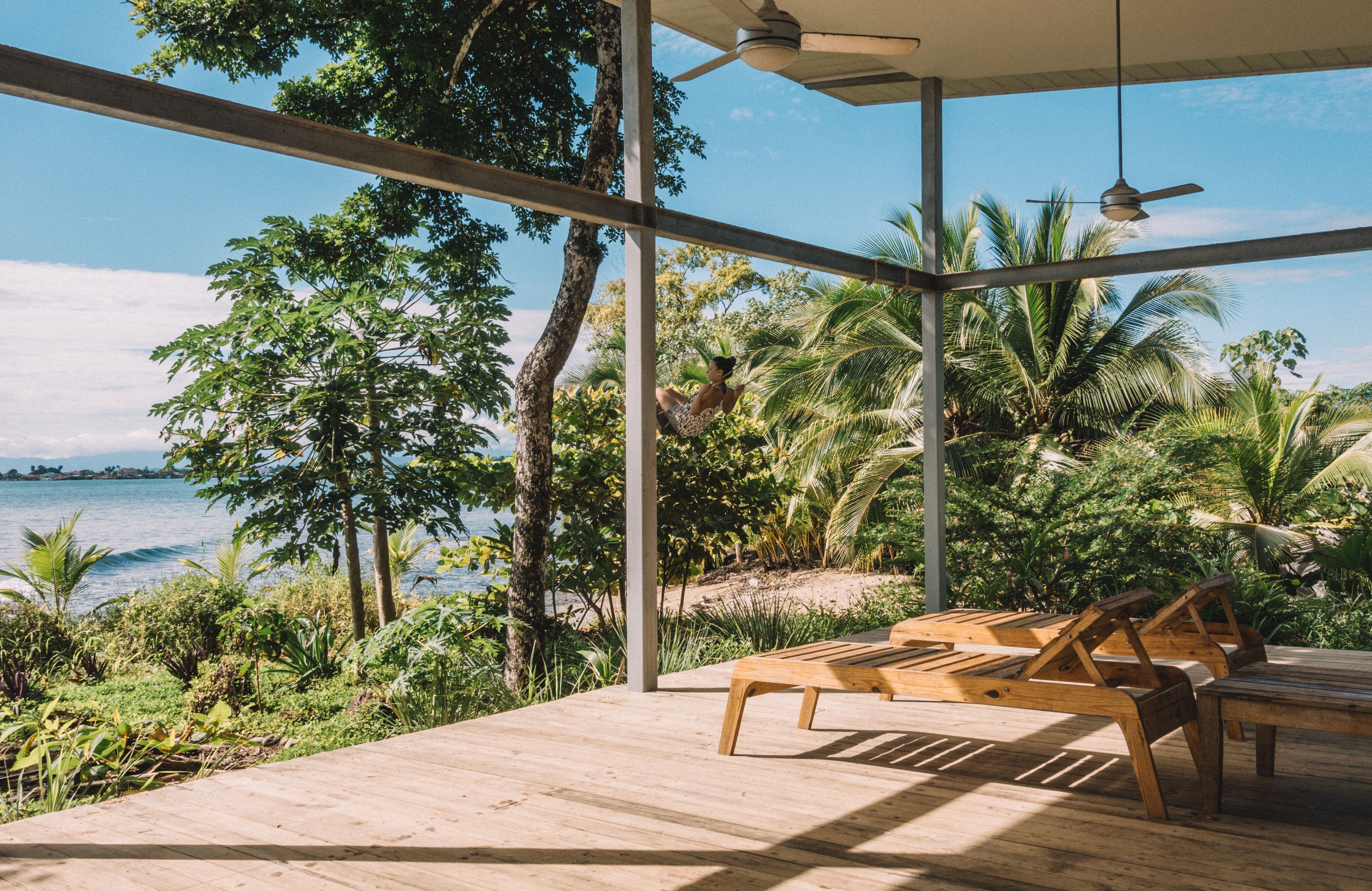 Relaxing tropical terrace overlooking the ocean in Panama, ideal for a vacation retreat.