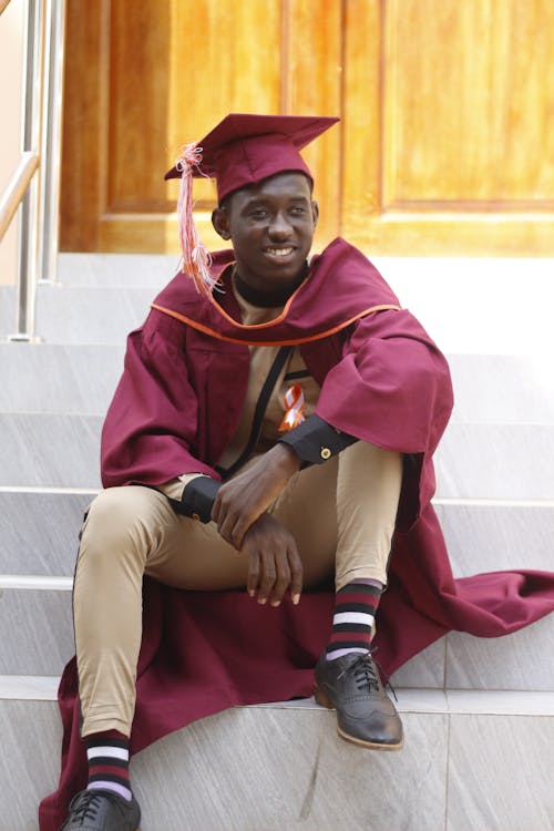 A Man In Hid Graduation Attire