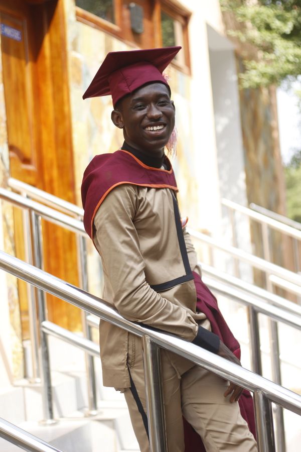 Happy Ghanaian graduate celebrating