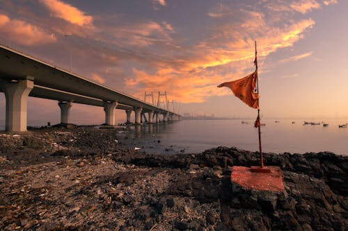 Flag near Bridge in Mumbai at Sunset