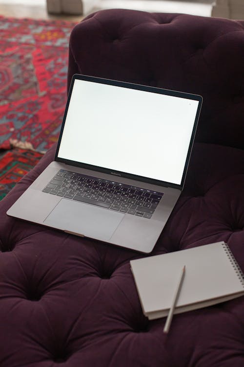Free A Laptop on the Sofa Stock Photo