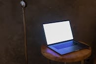 A Laptop on the Wooden Table