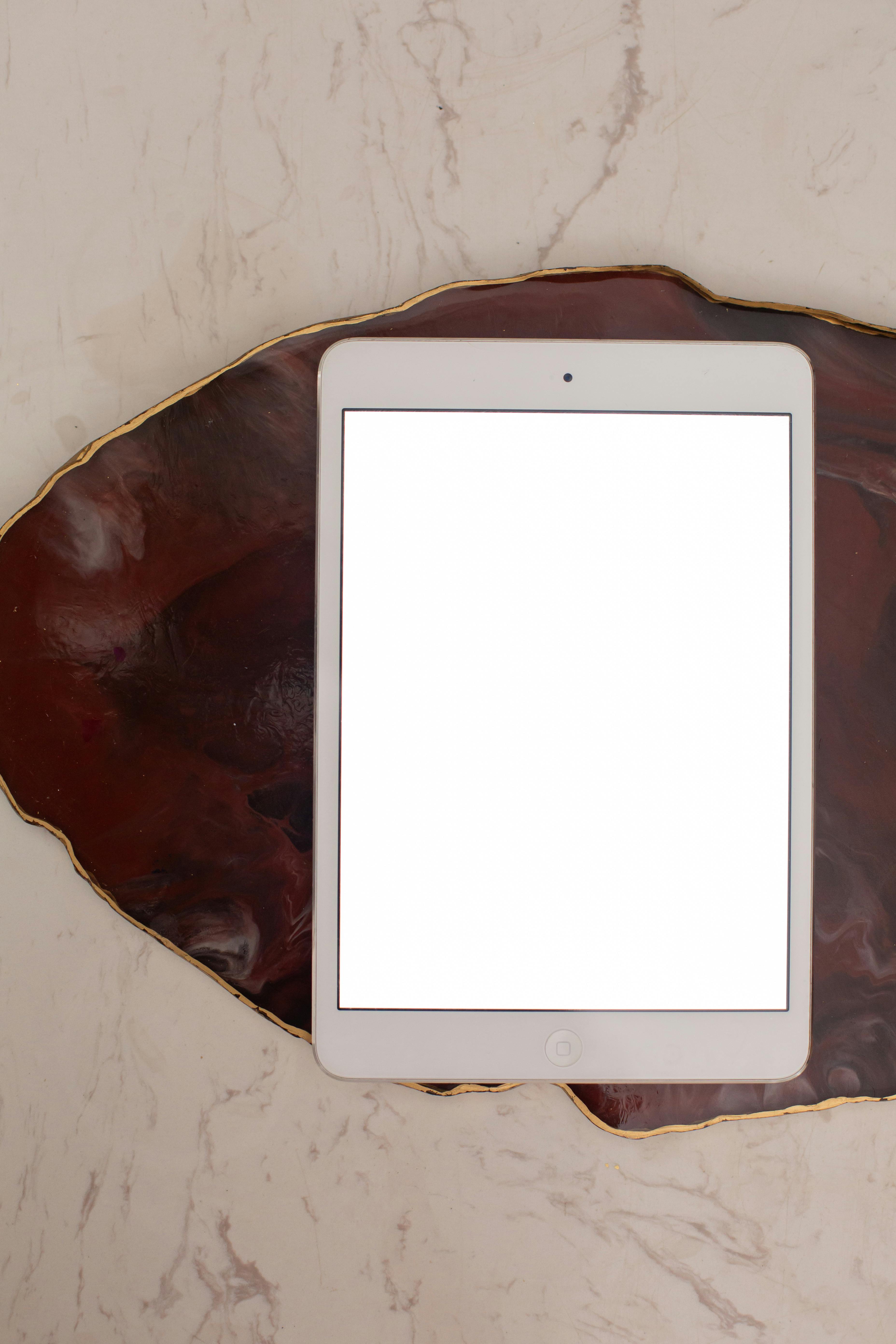 a tablet on marble surface