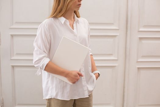 Crop elegant woman with blank book