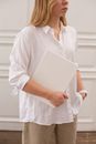 Calm crop woman with mock up notebook