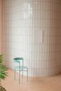 Interior of contemporary hall with green potted plant and blank rectangular shaped poster