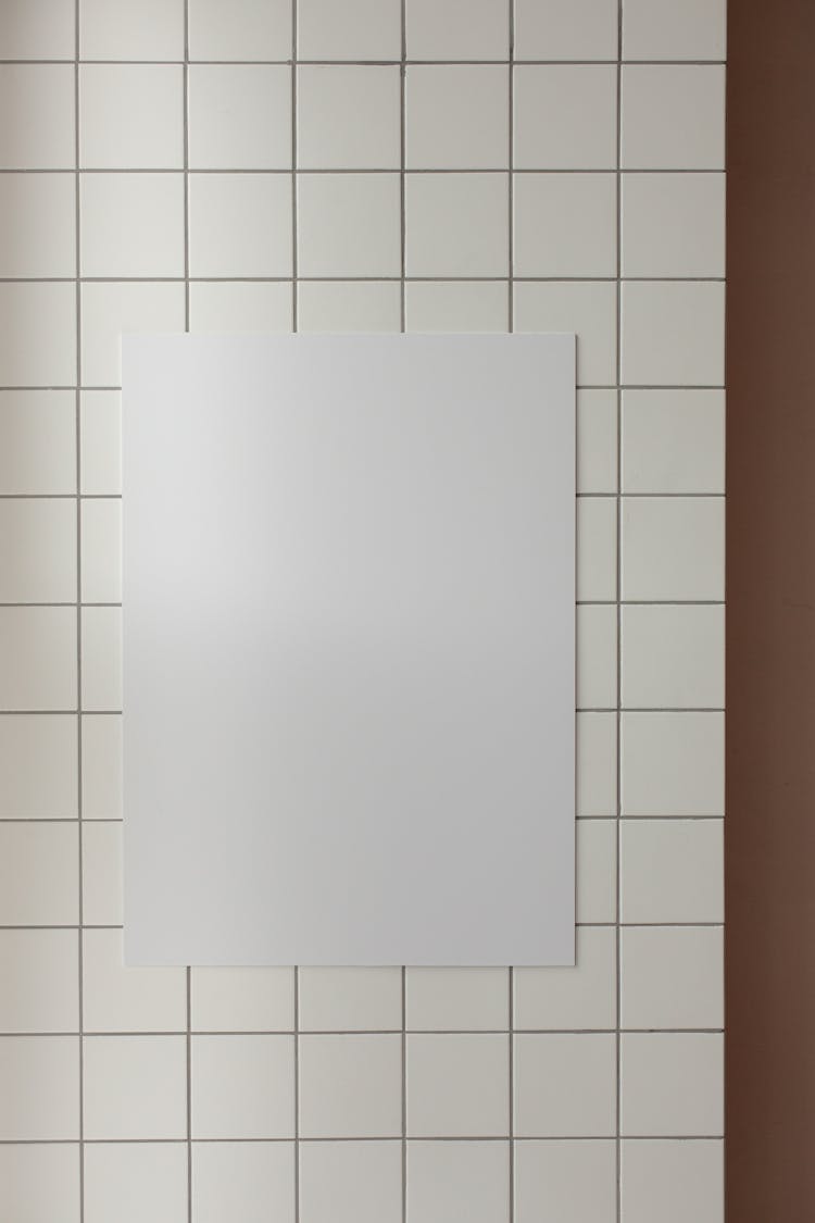 White Board On Tile Wall In Room