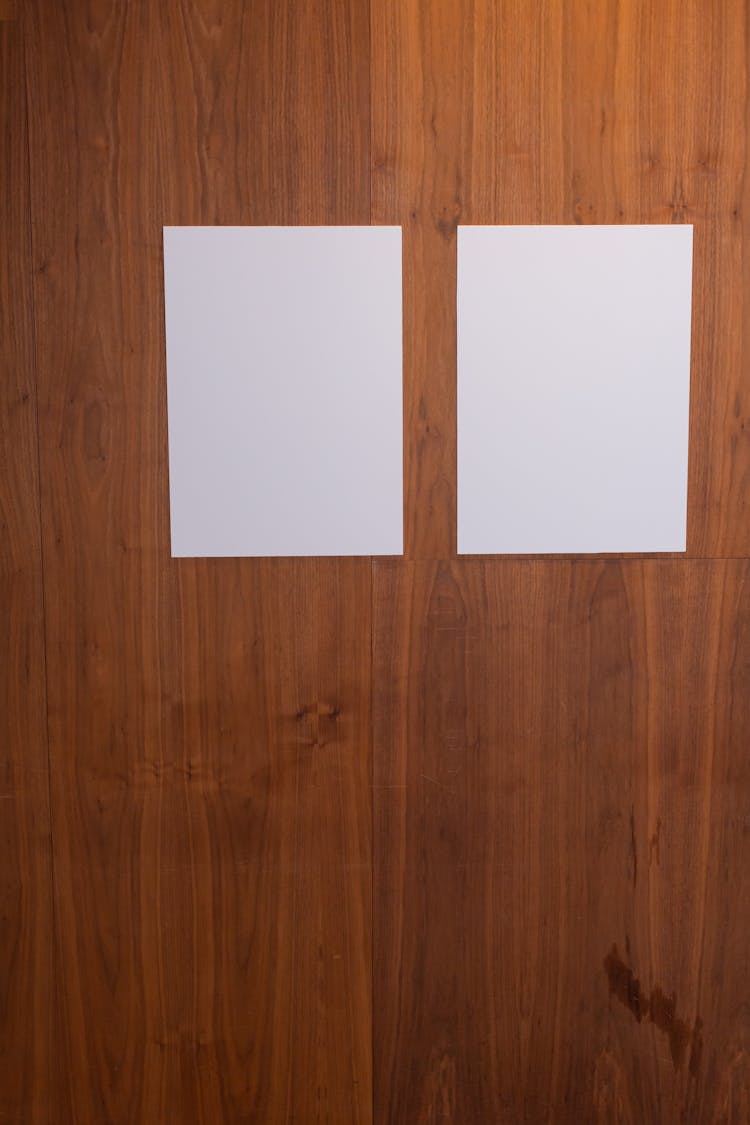 Blank Sheets On Wooden Wall