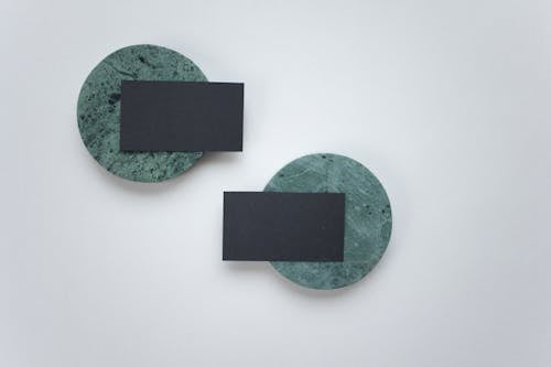 Blank business cards on coasters