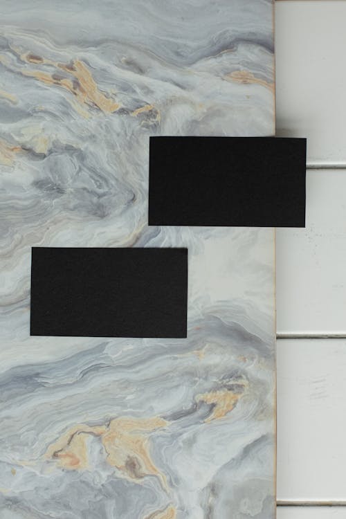 Free Blank business cards on marble surface Stock Photo