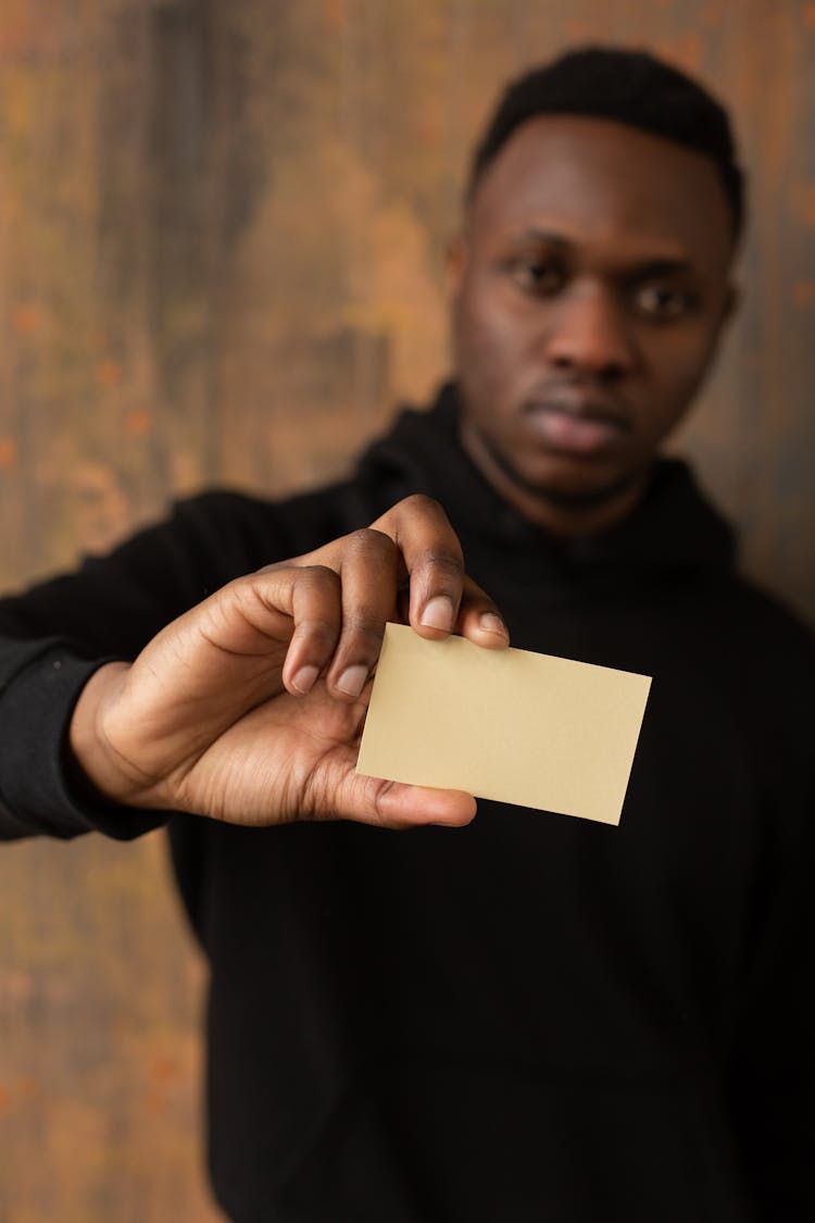 Black Man Showing Mock Up Business Card