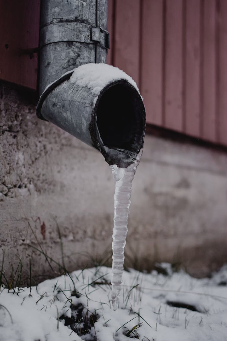 Frozen Water On Drain Spout 