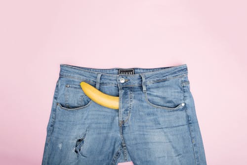 Free Denim Jeans on the Table Stock Photo