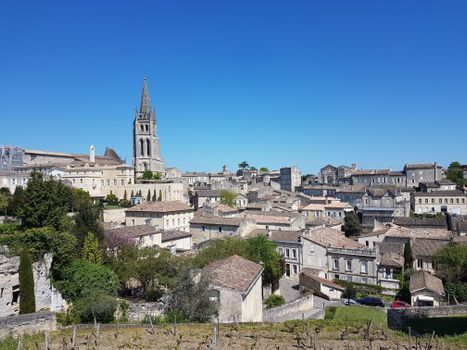 Charming medieval town of Saint-Émilion, UNESCO heritage site, with a historic bell tower.