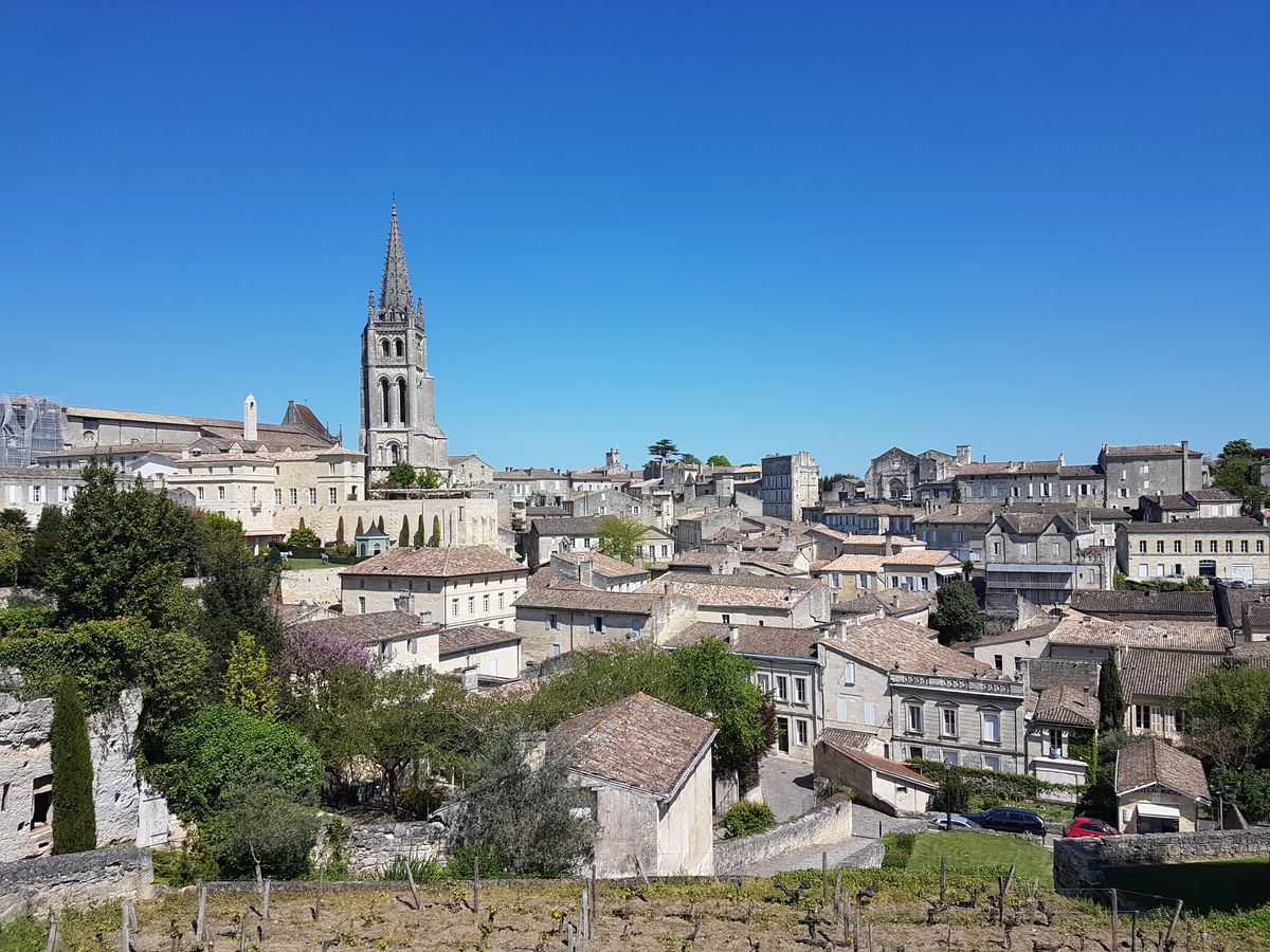 Saint-Émilion village, the monolithic church tower over honey-stone roofs