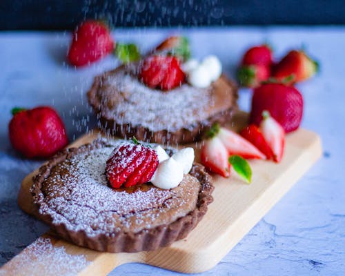 Free Strawberry Tarts on Brown Wooden Chopping Board Stock Photo